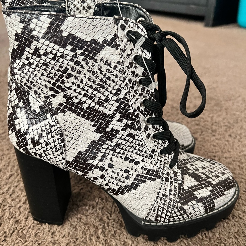 Snakeskin heeled booties